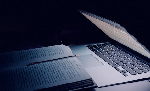 computer screen light highlighting a book