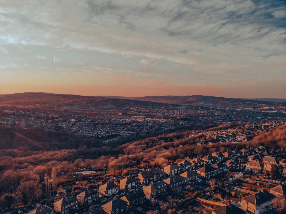 Aerial shot over Sheffield at sunset.